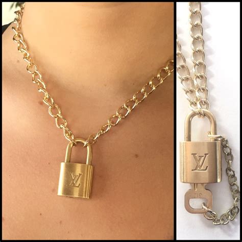 louis vuitton necklace silver and gold|Louis Vuitton gold lock necklace.